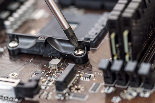 motherboard-with-screwdriver-close-up_359031-3602