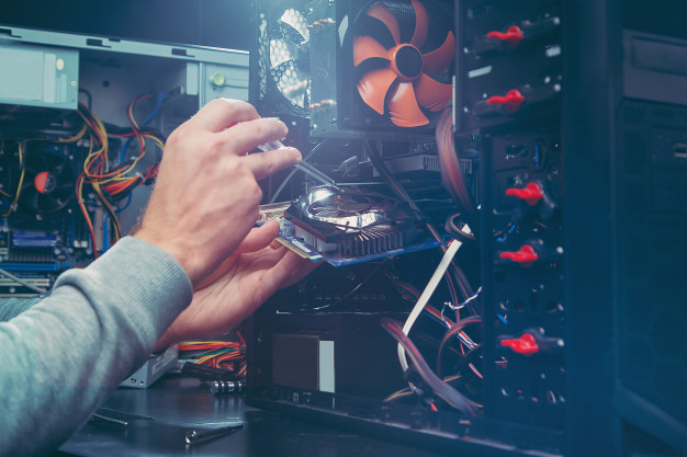 technician-repairing-computer-process-replacing-components-motherboard_121234-91